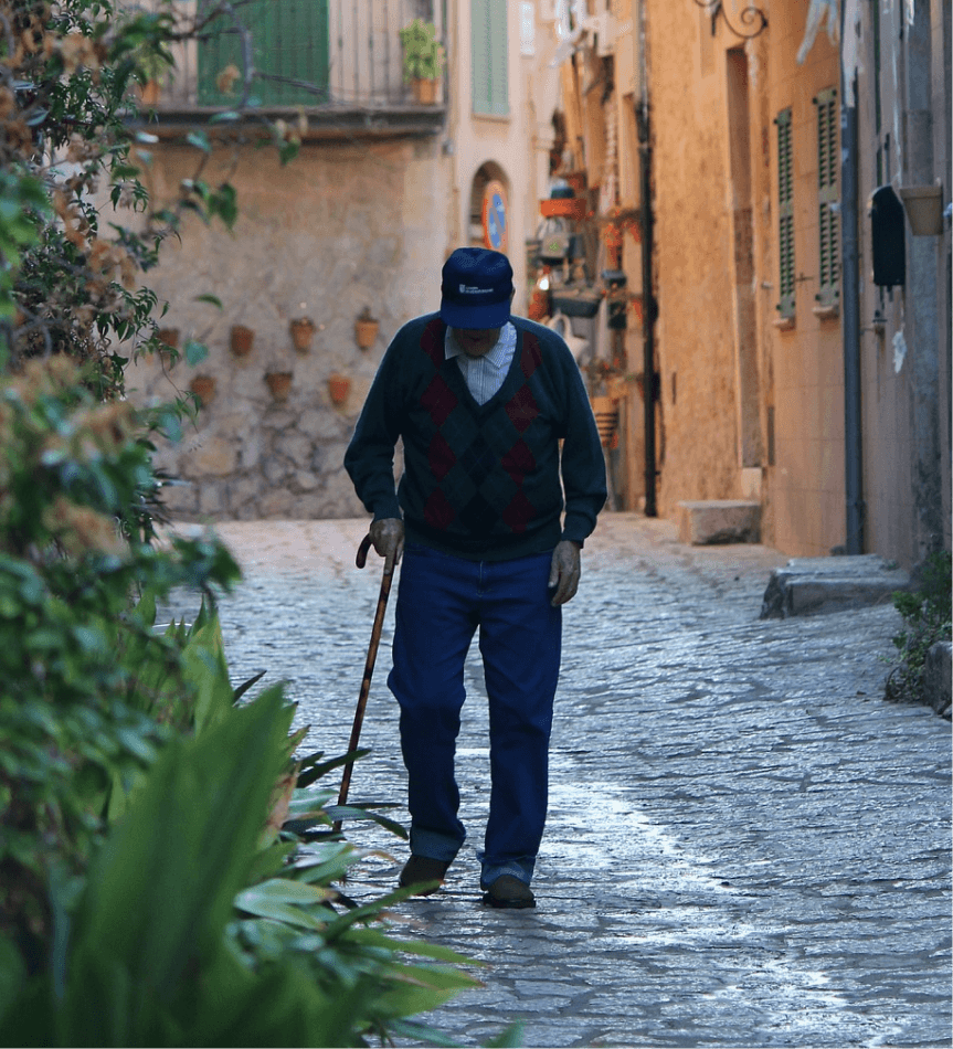 Elderly person by the lake